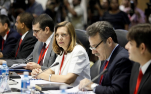 The Cuban delegation, from r., Machin, Vidal, and José Cabañas, head of the Cuban Interests Section in Washington